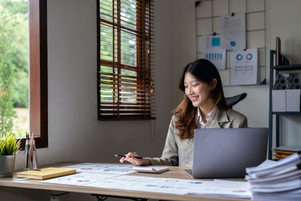 portrait asian woman accountant working with computer and calculator for business and financial 1